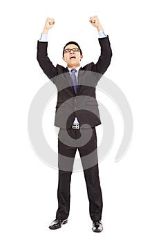 Success businessman raised up and shout loudly