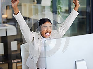 Success, celebration and happy woman at computer in callcenter with good news email or project report. Achievement