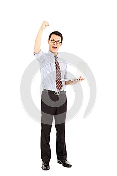 Success computer engineer is standing and raise hand