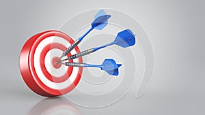 Success concept Darts hitting a target.