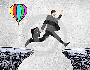 Success concept with jumping businessman