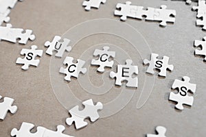 SUCCESS concepts, white jigsaw puzzles