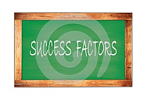 SUCCESS  FACTORS text written on green school board