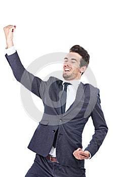 Success lies around the corner. Studio shot of a young businessman isolated on white.