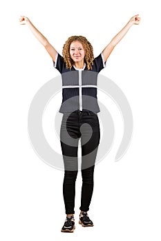 Success positive emotions, freedom concept. Full length portrait of happy teen girl, curly hair, lifting hands up looking to