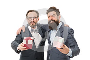 Success and reward. esthete. businessmen in formal suit on party. bearded men hold valentines present. business partners