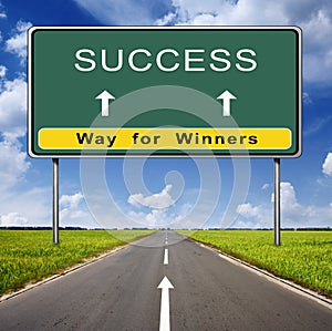 Success road sign on blue sky background