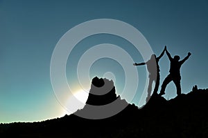 Success silhouette on mountaintop