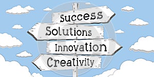 Success, solutions, innovation, creativity - outline signpost with four arrows