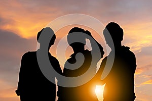 Success and Teamwork Concept, Silhouette of engineer and worker team with clipping path standing with sunset background