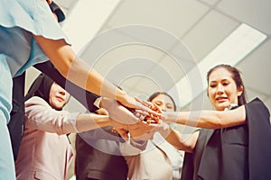 Success Teamwork Concepts, Business people with joined hands as a team, Group of diverse hands together joining, Young business