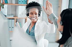 Success, teamwork and high five with black woman in call center for customer support, contact us and communication