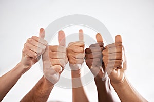 Success, winning or hands of people with a thumbs up for teamwork, support or motivation. Diversity, business and