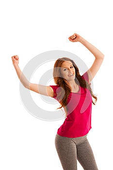 Success - woman gesturing victory with her hands raised in the a