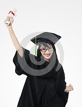 Success woman in graduation gown