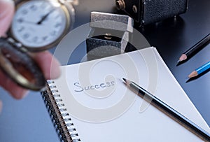 Success is written on small notepad