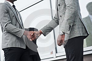 Successful African American business men after signing the contract.