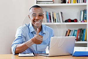Successful african american man at computer