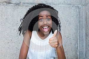 Successful african american woman showing thumb up