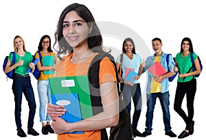 Successful arabic female student with group of students