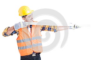 Successful architect holding a meter instrument as precise measurement concept