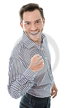 Successful attractive young business man holding fist up isolate