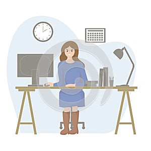 A successful beautiful woman at work. Comfortable workplace with a table, computer and necessary things for business