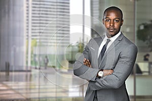 Successful black business man ceo downtown workspace proud confident arms crossed