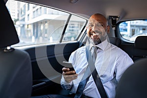 Successful black businessman in car