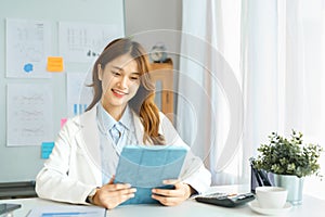 Successful business concept, Businesswoman hold tablet to reading financial report of new project