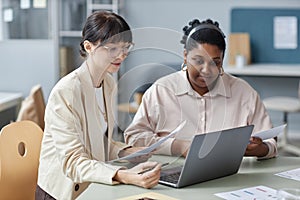 Successful Business Ladies Working in Office