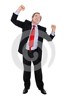 Successful business man cheering