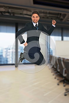 Successful business man jumping