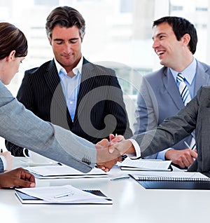 Successful business people closing a deal