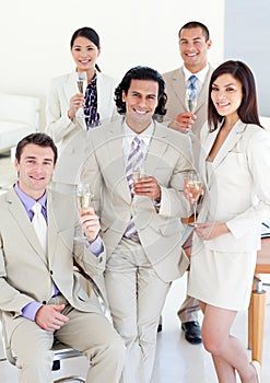 Successful business people drinking Champagne