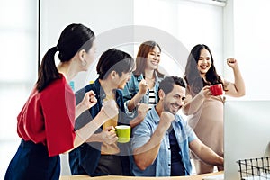 Successful business people group celebrating at meeting in modern office room