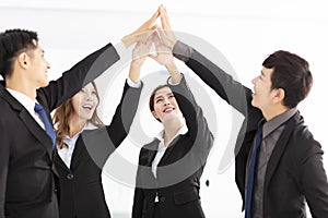Successful business team giving a high fives gesture