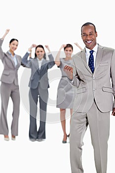 Successful business team with a happy businessman in foreground