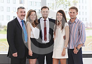Successful business team laughing together