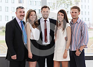Successful business team laughing together