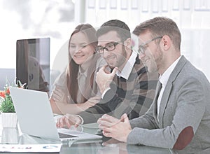 Successful business team sitting at the Desk