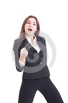 Successful business woman acting enthusiastic as a winner