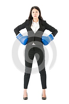 Successful business woman with boxing gloves