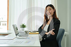 Successful business woman excited when her business growth and good news. Finance concept.