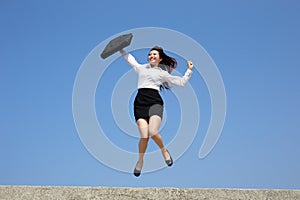 Successful business woman jump