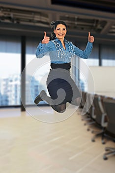 Successful business woman jumping