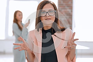 successful business woman shows a thumb up.