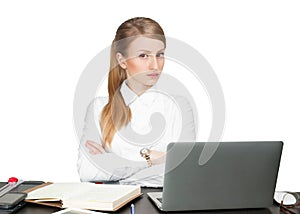 Successful business woman sitting at table using laptop computer