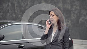 Successful business woman talking on cell phone