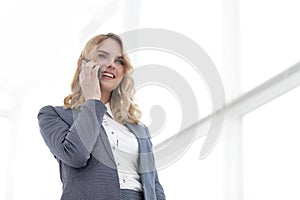 Successful business woman talking on the phone.